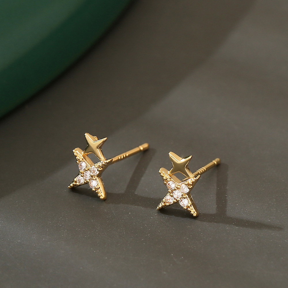 18K gold U-shaped earrings set with cubic zirconia